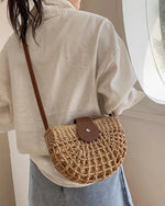 Bolso de paja hueco semicircular de estilo bohemio